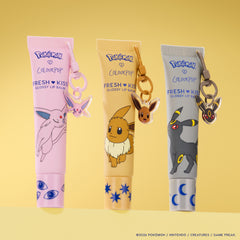 Daybreak and Moonlight trio: Espeon, Eevee and Umbreon Fresh Kiss Glossy Lip Balm tubes with character keychain charms