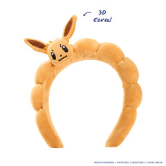 Eevee Headband on white: padded tan plush band topped with a 3D Eevee head