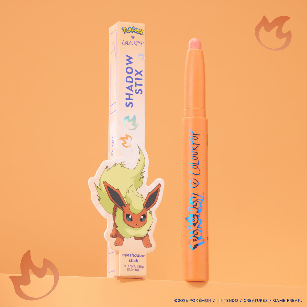 Flareon Multichrome Shadow Stix, a tangerine stick, next to its Flareon box on an orange backdrop