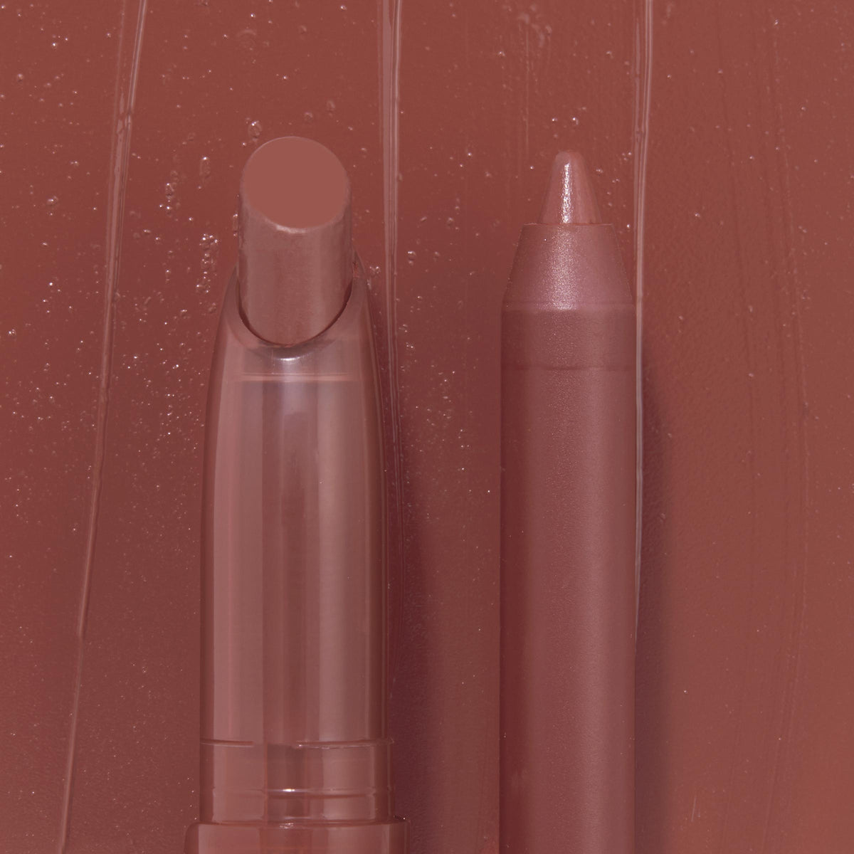 Big Smooch ColourPop Lippie Stix + Pencil Set showcasing a creamy rosy-mauve Lippie Stix and matching lip pencil standing side by side against a swatched, dewy nude backdrop, close-up product shot.