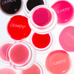 Open pots of Jelly Glow Lip & Cheek Jelly in berry, pinks and reds from above