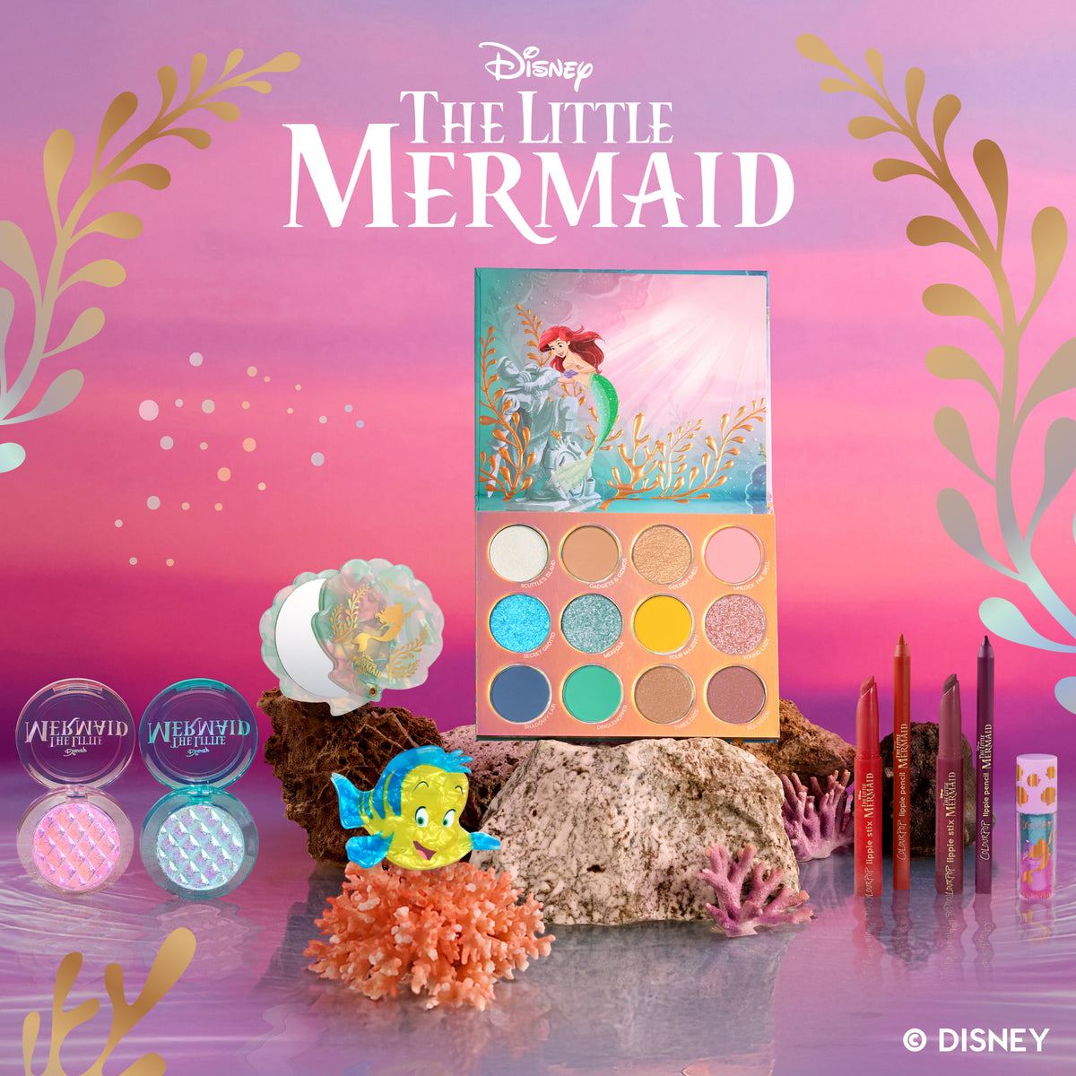 ColourPop and Disney's The Little Mermaid Collection on a coral reef set: Under the Sea palette, highlighters, lip kits, mirror and Flounder clip