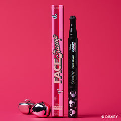 Merry Mickey Face Stamp, a pink and black dual-ended stamp, beside its Face Stamp box with silver jingle bells