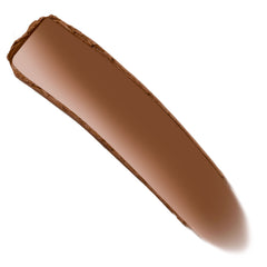Shell Beach shade of ColourPop Bronzer Stix creating a single smooth swipe of warm tan-brown cream with a satin finish, shown as an inline swatch on a clean white background.