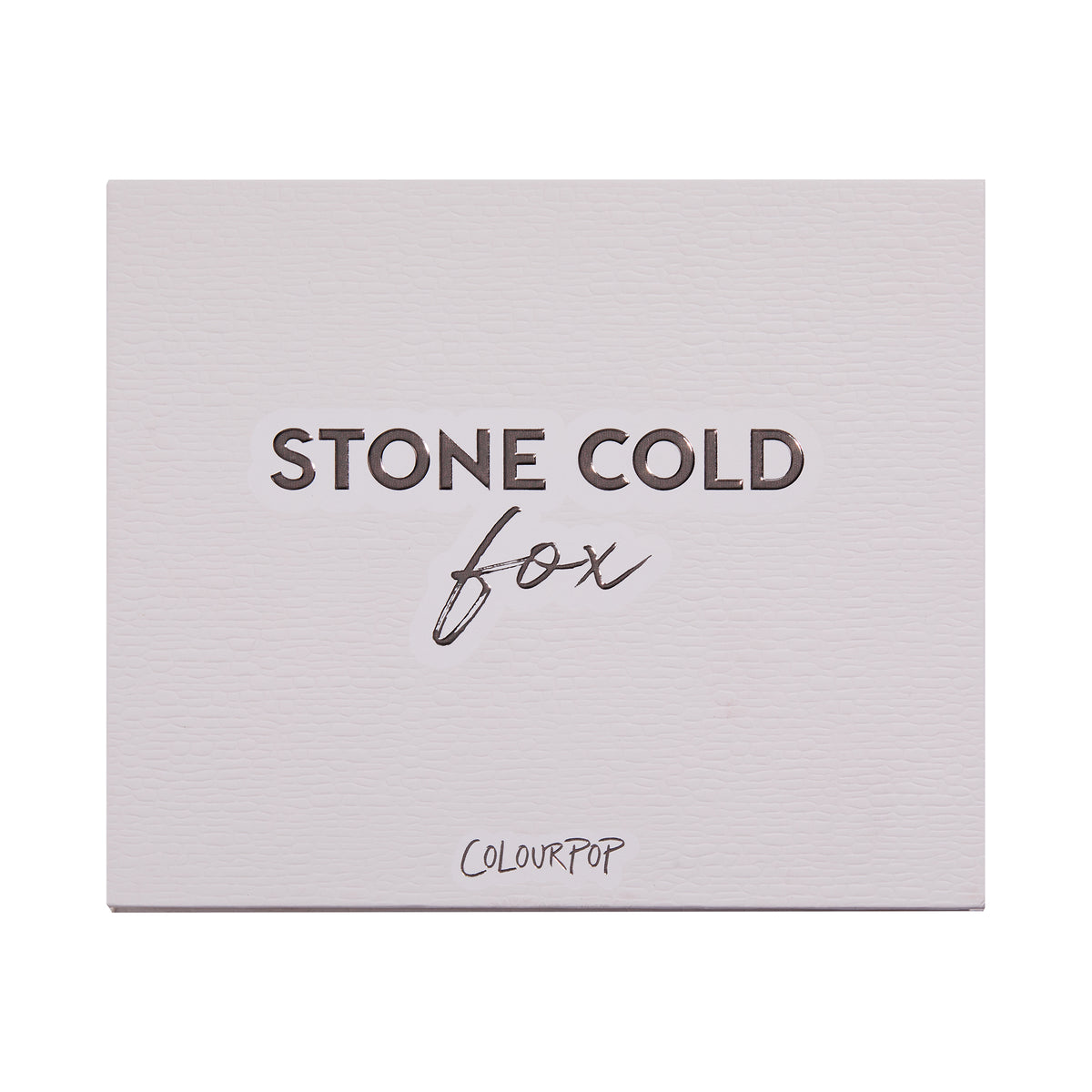 Stone Cold Fox shadow palette shown closed, featuring embossed βSTONE COLD foxβ lettering on a pale taupe faux-leather cover with ColourPop logo, studio-lit on a white background; a sleek neutral ColourPop Shadow Palette packaging shot.