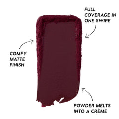Deep berry swipe of Newborn Powder To Creme Lipstick from the Twilight collection, showing rich full-coverage color with a comfy matte finish and creamy texture against a clean white background.