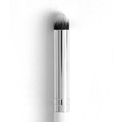 ColourPop Pencil Brush showcasing a tapered, densely packed tip with a chrome ferrule and slim white handle, positioned upright for precise eyeshadow smudging and detail work against a clean white background.