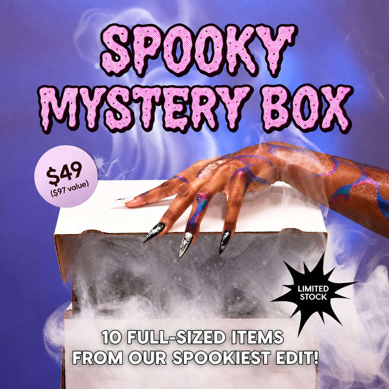 Spooky Mystery Box: a smoking box with a costume-gloved hand, 10 full-size ColourPop items worth $97