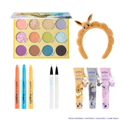 Infinite Possibilities set laid flat: Eeveelution palette, Eevee headband, Shadow Stix trio, BFF liner duo and Fresh Kiss lip balm trio
