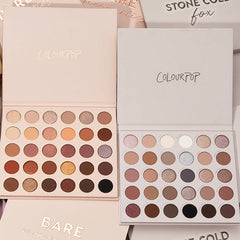 Bold + Bare ColourPop Shadow Palette Set displaying two open 30-pan palettes - warm neutrals and coppers on the left, cool taupes, mauves, and charcoals on the right - with matte and shimmer finishes, on a beige background with branded sleeves.