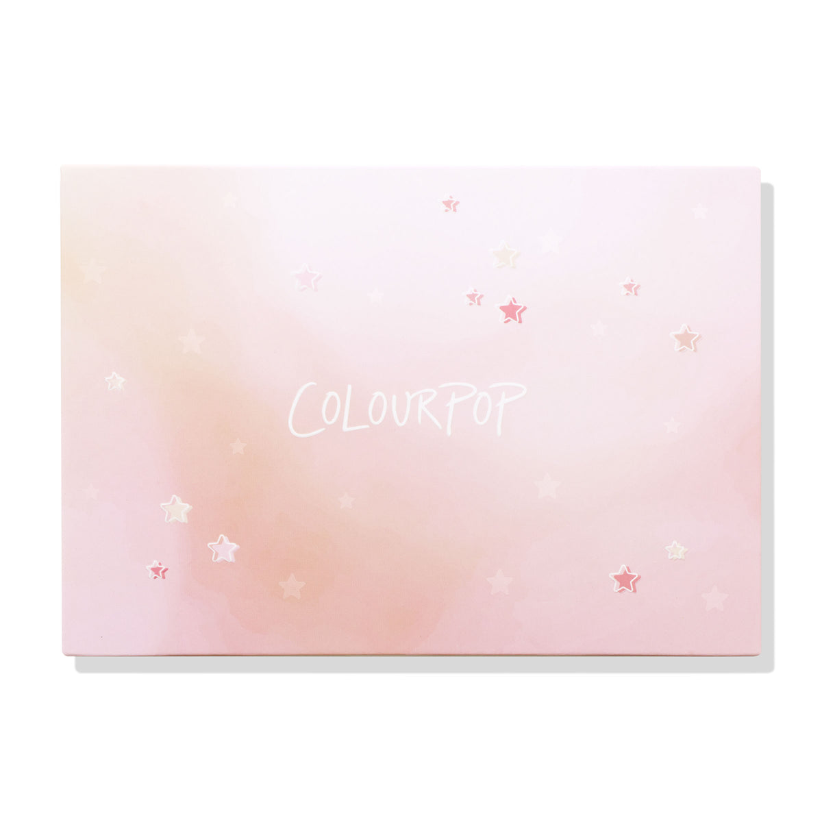 ColourPop Stars Large Empty Palette closed and front-facing, displaying a pink ombré lid sprinkled with star graphics and the COLOURPOP logo on a white backdrop; ColourPop Empty Palette for customizing shades.