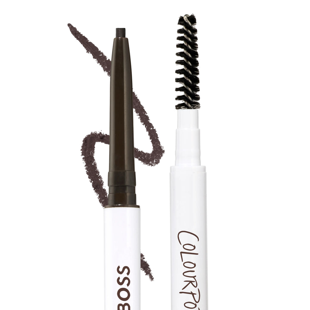 ColourPop Brow Boss Pencil in Ash Brown shown uncapped with a fine retractable brow makeup tip and built-in spoolie brush, against a white background with a brown swatch demonstrating the cool-toned shade.