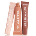 Sweet Treats ColourPop Glossy Lip Balm Trio standing in a fan: three Fresh Kiss squeeze tubes in blush pink, peach, and cocoa, center tube uncapped showing slanted applicator, set against a clean white background.