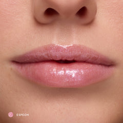 Close-up of fair-tone lips wearing Espeon sheer lilac glossy lip balm
