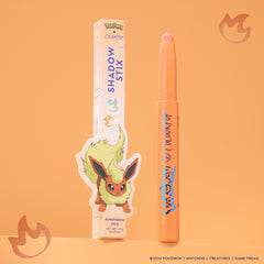 Flareon Multichrome Shadow Stix, a tangerine stick, next to its Flareon box on an orange backdrop