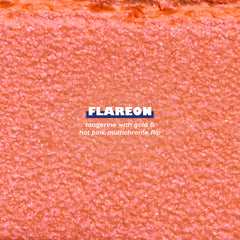 Flareon Multichrome Shadow Stix texture swatch: tangerine with a gold and hot pink multichrome flip