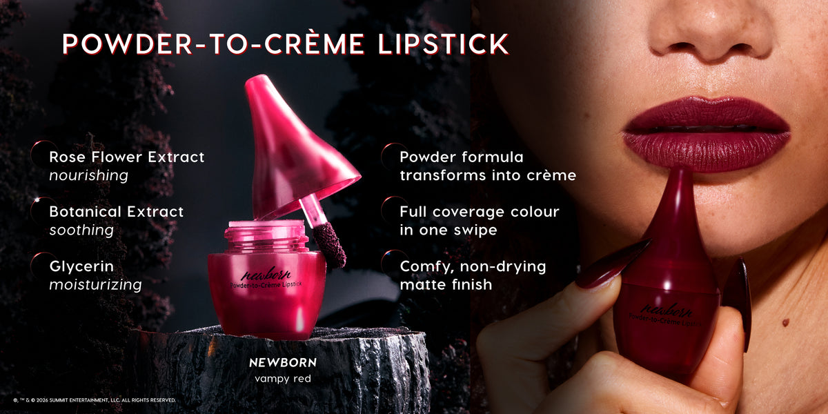 Newborn vampy red powder-to-crème lipstick bottle and applicator shown open on a dark rock while a model applies the rich matte vampy red shade to full lips, highlighting nourishing rose flower extract, soothing botanical extract, and moisturizing glycerin benefits.