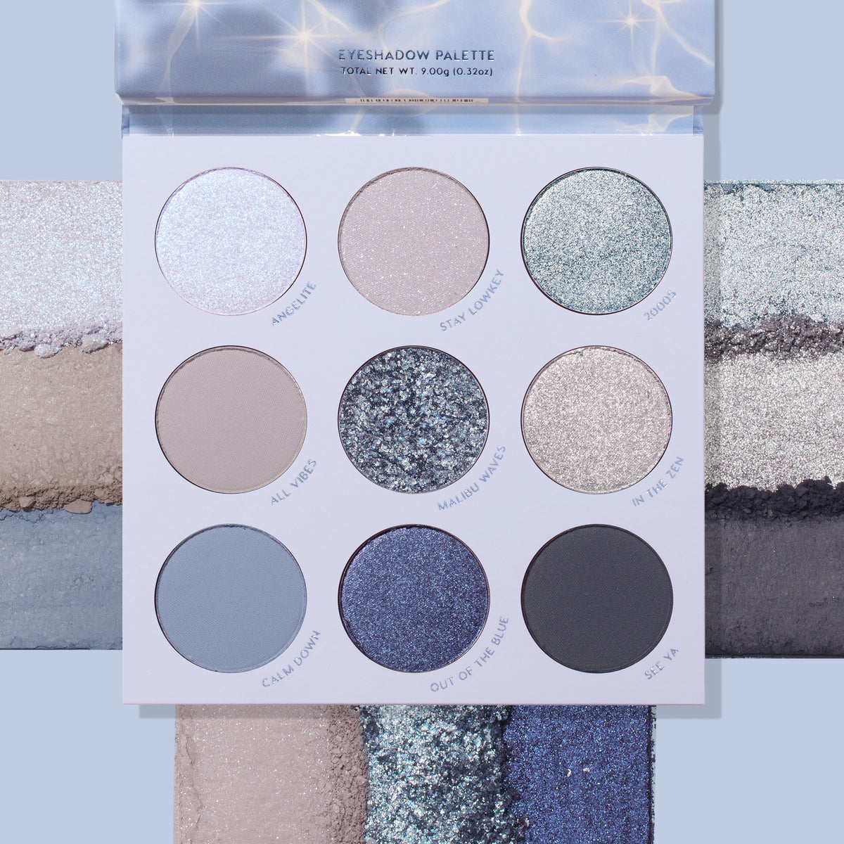 ColourPop Shadow Palette So Elemental opens to reveal a nine-pan range of cool tones - icy silver, champagne, seafoam shimmer, matte beige, silver glitter, taupe shimmer, dusty blue, navy sparkle, and charcoal matte - set over coordinating swatch stripes.