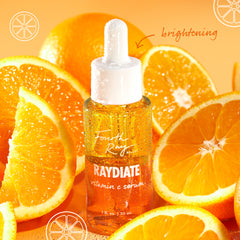 RAYdiate Vitamin C Serum by Fourth Ray Beauty (ColourPop Face Serum) displayed as a dewy dropper bottle beaded with condensation, standing among juicy orange slices on a bright orange backdrop, emphasizing a brightening, glow-boosting formula.