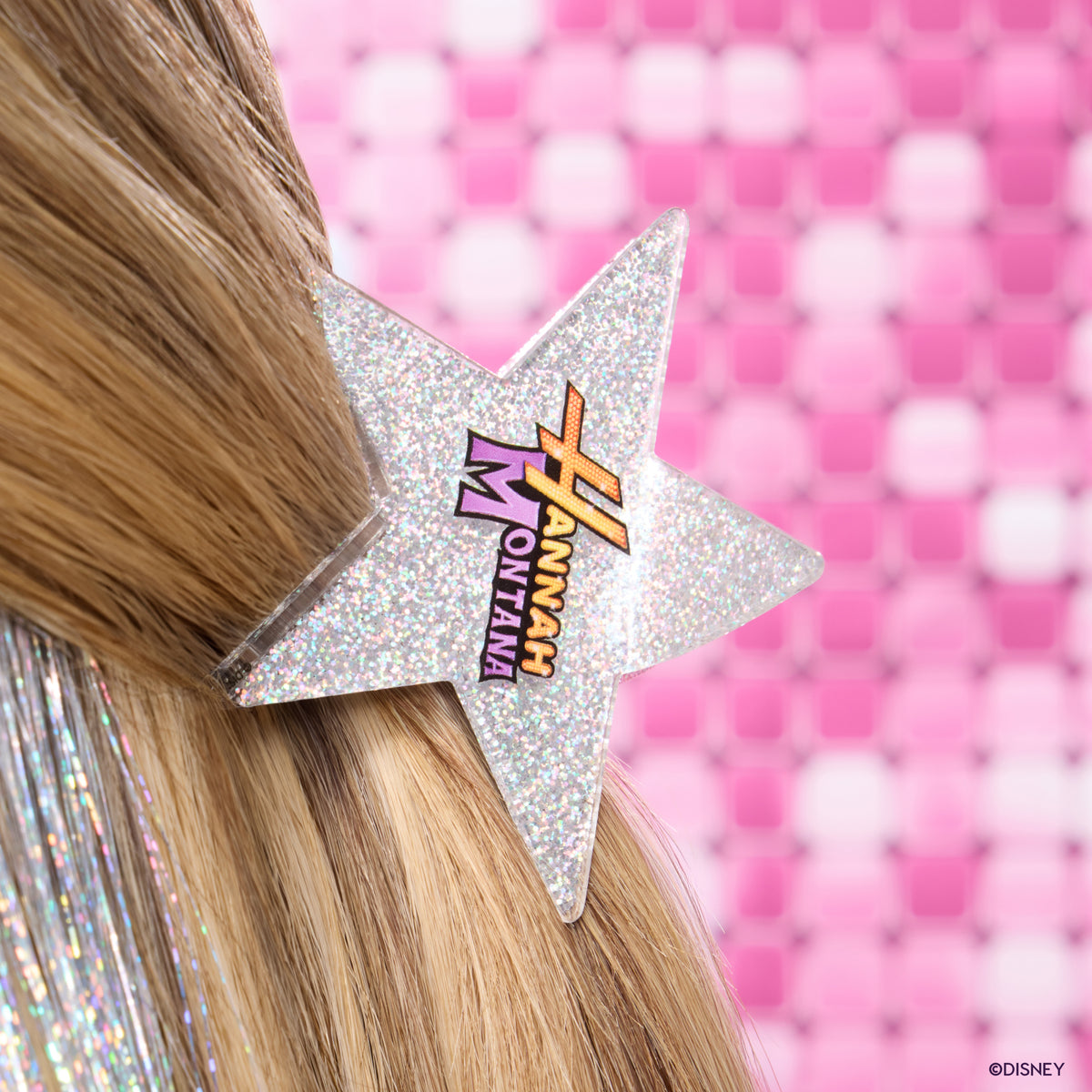 Silver glitter star Hannah Montana Hair Clip in long blonde hair