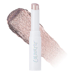 Make A Toast Jelly Much Gel Eyeshadow Stick uncapped beside a shimmery swatch