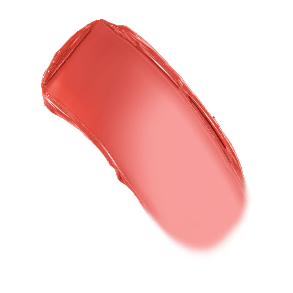 Creamy swipe of ColourPop Lip and Cheek Balm in Second Date, a warm coral‑pink swatch arcing on a white background, showing dewy, semi‑sheer, buildable coverage for multitasking lip and cheek color.