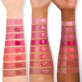 Adore You ColourPop Lip and Cheek Balm swatched on three forearms of different skin tones, a glossy rosy pink square among vertically stacked labeled shades, showing creamy, buildable color and dewy shine.