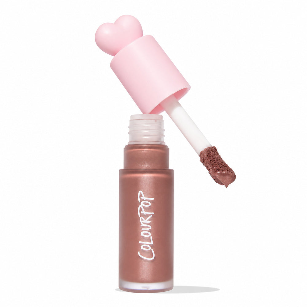 ColourPop Liquid Blush in City Walk - doe-foot wand lifting from a frosted bottle with a pink heart cap, creamy neutral rose pigment on the applicator - on a white background with an Allure Best of Beauty 2025 award badge.