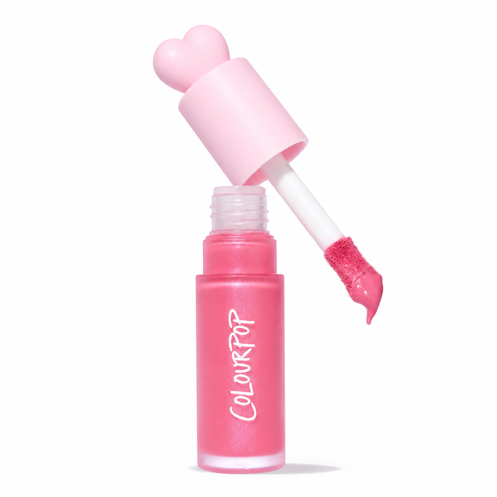 ColourPop Liquid Blush Princess Ave displays a frosted pink tube with COLOURPOP logo as the doe-foot applicator lifts a creamy rosy-pink swipe, topped by a heart-shaped cap, with a 2025 Allure Best of Beauty award badge on a white backdrop.