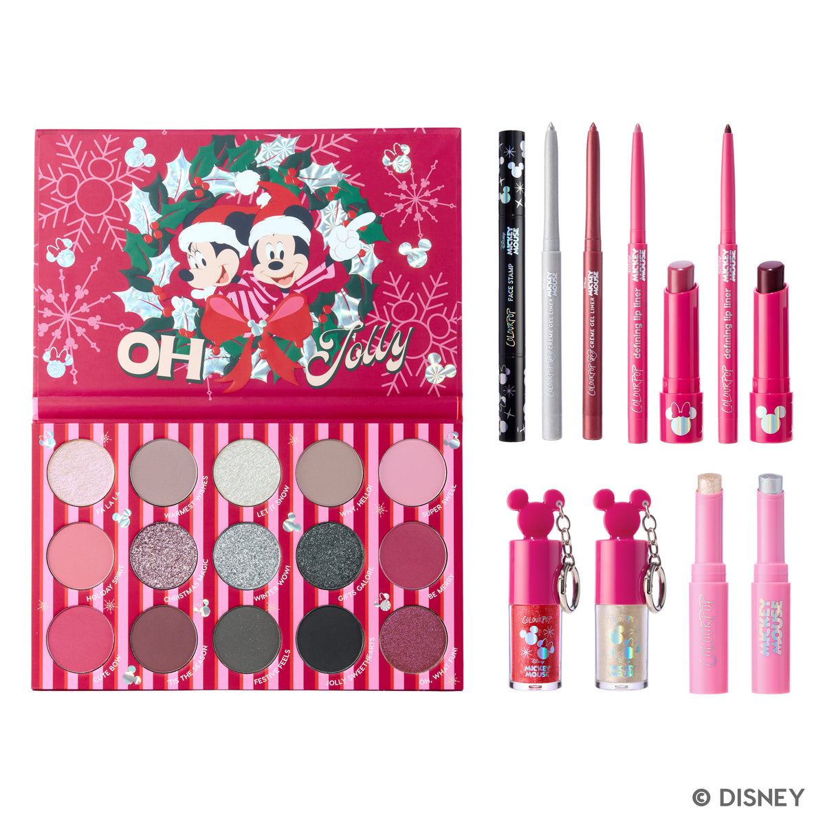A Very Mickey Christmas collection laid out: 15-pan palette, liners, lip kits, Mickey and Minnie keychain glosses
