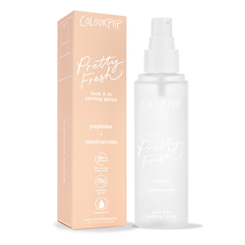 ColourPop Pretty Fresh Setting Spray Lock It In bottle stands beside a peach box on white, a frosted 3.4 fl oz mister with peptides and niacinamide, offering 16-hour wear, transfer-proof, waterproof makeup hold.