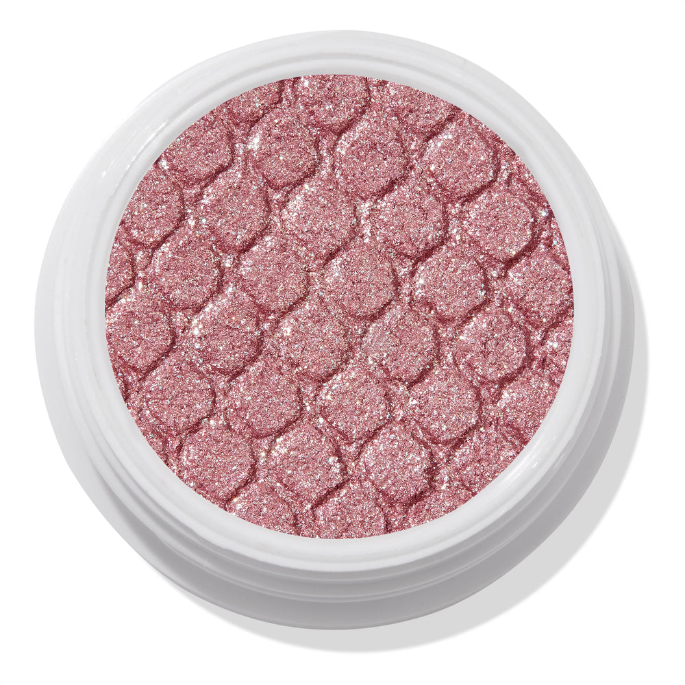 ColourPop Party of Five Super Shock Shadow glistens in a round white pot, a shimmering rose-pink single eyeshadow with fine silver sparkle and a quilted pressed texture, shown in a close-up top view.