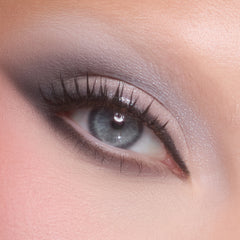 Close-up of a fair-skin eye with a soft grey and silver smoky look from the Silver Lining palette