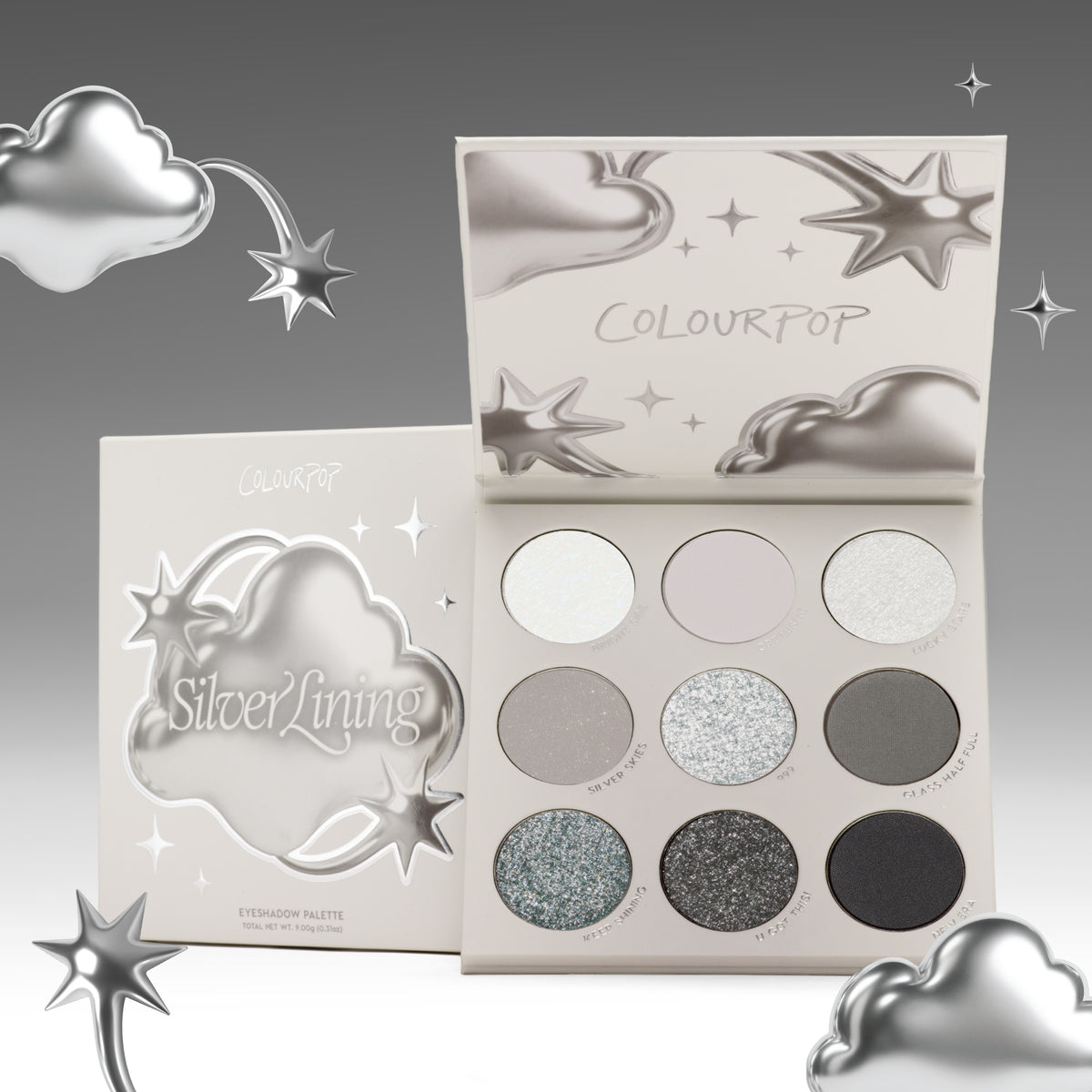 Silver Lining eyeshadow palette open beside its chrome cloud packaging with silver stars