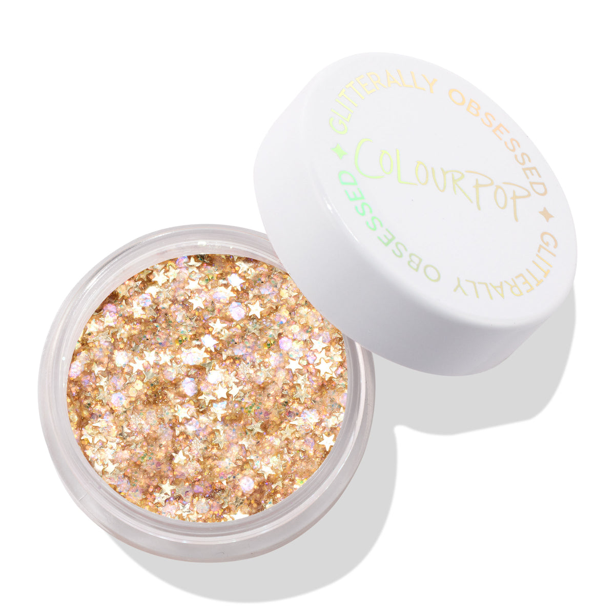 Spinner Glitter Gel in an open clear pot, showcasing chunky gold glitter with iridescent star shapes, the white lid reading ColourPop Glitterally Obsessed set aside on a white background; festival-ready ColourPop Glitter Gel makeup.