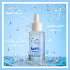 Fourth Ray Beauty Rainfall 2% HA Serum bottle standing in a splash of water, dropper capped, highlighting lightweight, all-day hydration and works-under-makeup claims; ColourPop Face Serum with 2% hyaluronic acid, 0.95 fl oz/28 mL.