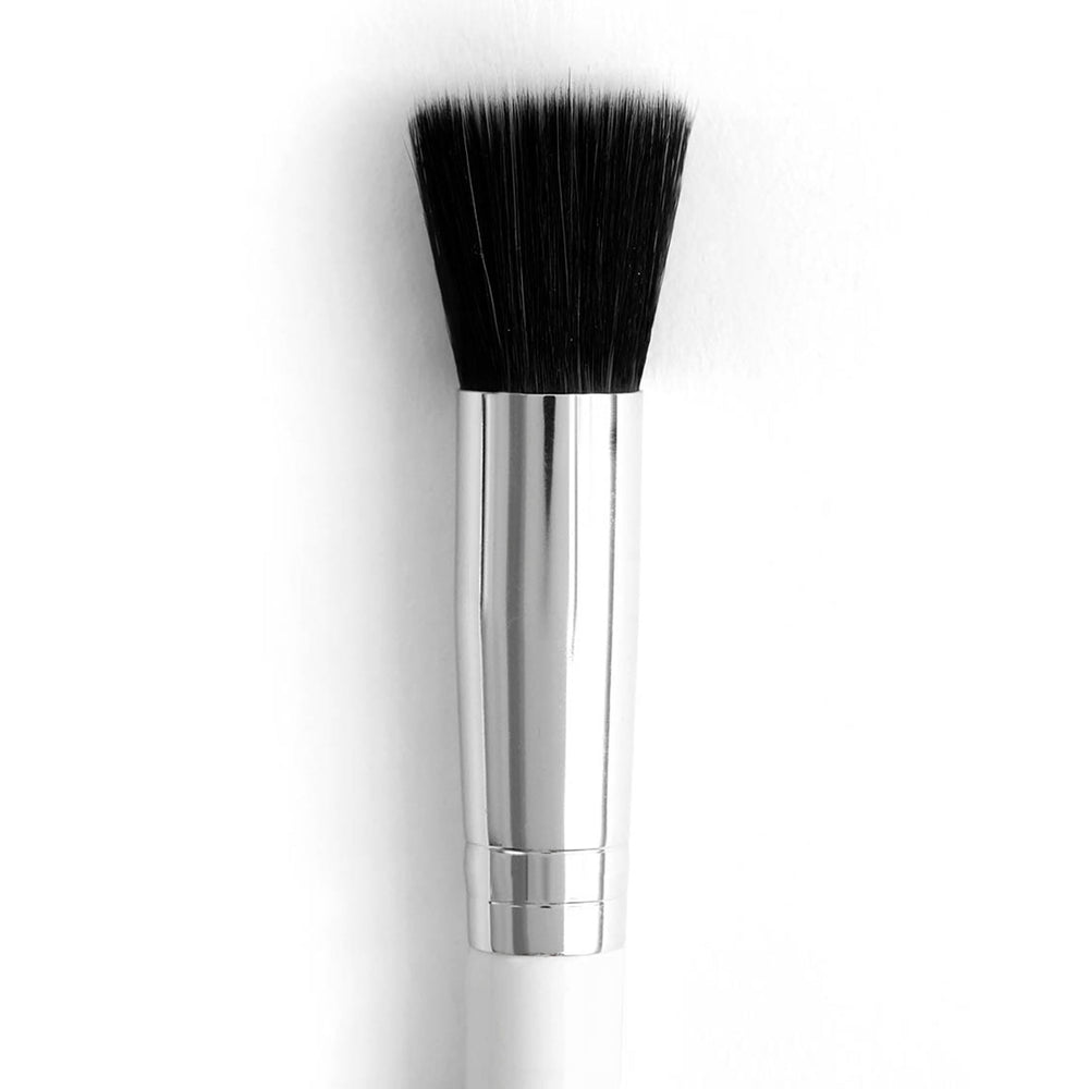 Stippling brush with flat-top black bristles and a shiny silver ferrule on a white handle, ColourPop makeup brush shown upright against a clean white background, designed for buffing and blending liquid or cream foundation.
