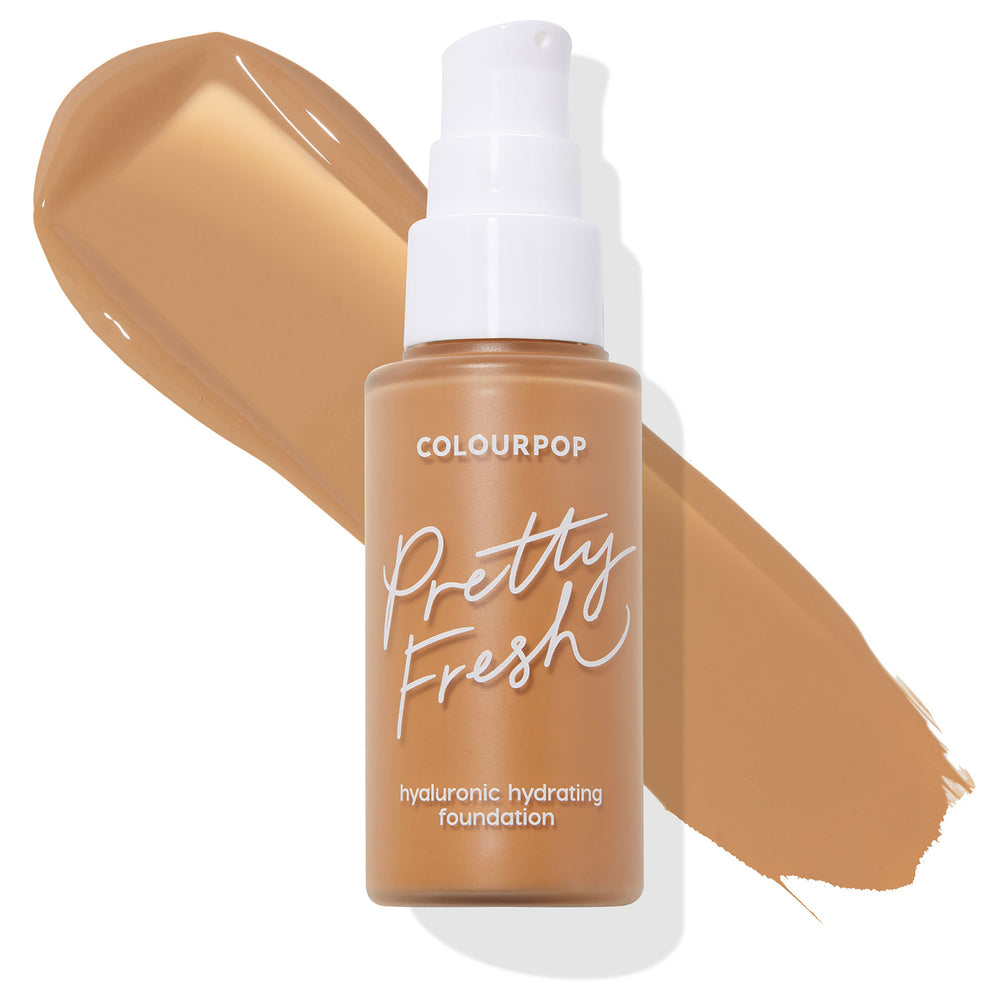 ColourPop Hyaluronic Hydrating Foundation in the Pretty Fresh shade Medium Dark 147 W stands in a frosted glass bottle with a white pump before a large tan swatch showing its warm undertone, studio shot on white.