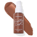ColourPop Pretty Fresh Hyaluronic Hydrating Foundation in Deep Dark 205 N, a pump-top frosted bottle set over a rich deep neutral-brown swatch on white, showcasing the shade and silky texture; ColourPop Hyaluronic Hydrating Foundation.