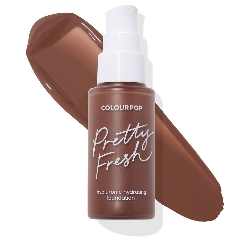 ColourPop Hyaluronic Hydrating Foundation Pretty Fresh in Deep Dark 210 C, a frosted pump bottle with white cap, stands over a large chocolate-brown swatch, showcasing the rich shade on a clean white background.