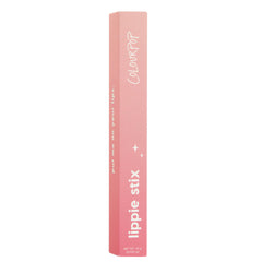 ColourPop Lippie Stix in Toasty stands upright, showcasing a slim pink-to-coral gradient box with white lippie stix and ColourPop branding and net wt 1.0 g (0.035 oz), set against a clean white background.