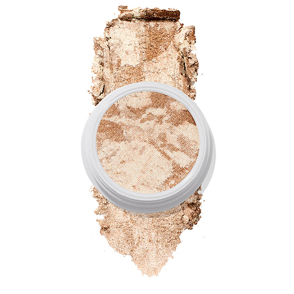 ColourPop Churro Super Shock Highlighter sits in a round white pot, its marbled champagne and bronze shimmer swatched beneath in a wide crushed streak on a clean white background.
