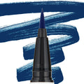 Felt-tip applicator depositing bold navy pigment, ColourPop BFF Liquid Liner in Crzy shown in macro close-up on white, with sweeping cobalt-blue swatches behind highlighting the precise black pen tip and color payoff.