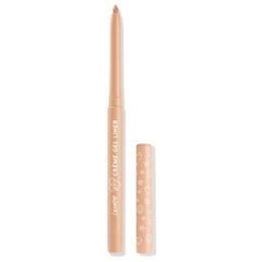 ColourPop Crème Gel Liner Honeydude shown uncapped, twist-up nude beige eyeliner with rounded tip standing upright on a white background, its peach cap set beside it with white heart, star, and smiley doodles.