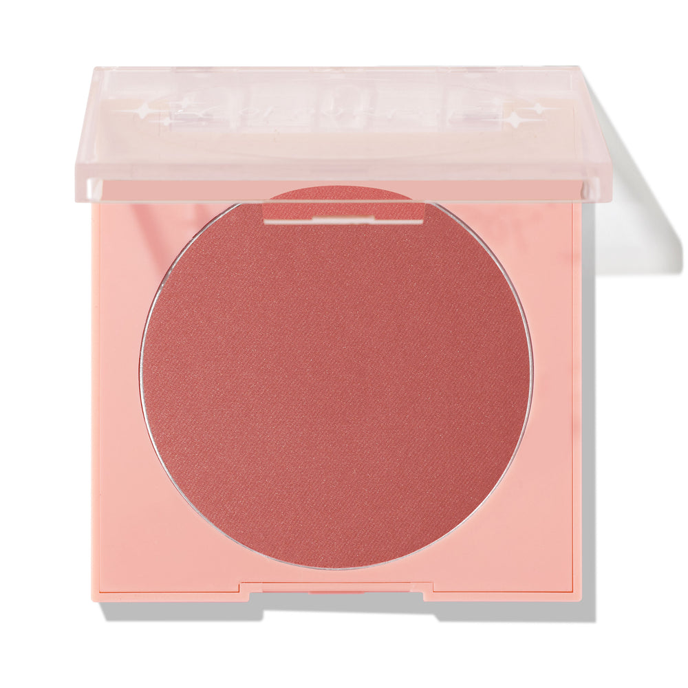 ColourPop Pressed Powder Blush in Just Cruisin' opens to reveal a large matte rose pan in a peach square compact with a clear lid half-closed, shown in a clean studio shot on white.