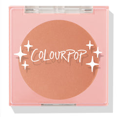 No Rules ColourPop Pressed Powder Blush displays a warm peach pan in a pink square compact with a clear lid, white ColourPop logo, and star sparkles, shown closed against a white background.