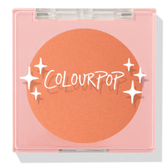 ColourPop Pressed Powder Blush Pretty Toasty compact displaying a warm toasted peach pan, closed under a clear lid with white sparkles logo, set in a pale pink square case for travel-friendly, everyday makeup.